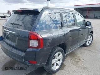 2015 Jeep Compass Sport with VIN 1C4NJDBBXFD151700, listed as a IAAI auction lot 41855482 with 124,822 mi miles. Bid and sale history available at carsss.com. Image 4.