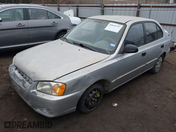 2001 Hyundai Accent GL with VIN KMHCG45C61U156696, listed as a IAAI auction lot 41643757 with 336,344 mi miles. Bid and sale history available at carsss.com. Image 2.