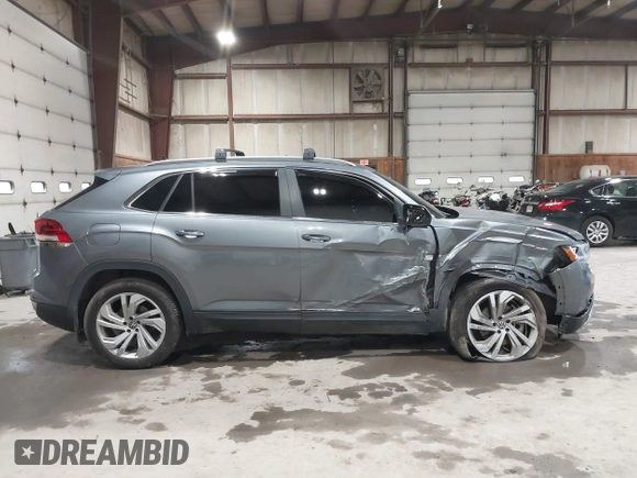 2021 Volkswagen Atlas SEL z VIN 1V2BE2CA6MC203777, wystawiony jako IAAI lot #42507511 z przebiegiem 76 358 mil mil oraz . Historia ofert i sprzedaży dostępna na DreamBid. Obrazek 13.