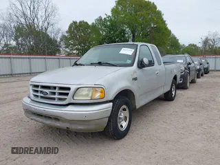 2002 Ford F-150 XL with VIN 1FTRX17282NA84011, listed as a IAAI auction lot 41871210 with 1 mi miles. Bid and sale history available at carsss.com. Image 6.