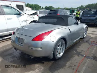 2004 Nissan 350Z Touring z VIN JN1AZ36A94T013851, wystawiony jako IAAI lot #42335966 z przebiegiem 180 814 mil mil oraz . Historia ofert i sprzedaży dostępna na DreamBid. Obrazek 4.