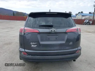 2018 Toyota RAV4 LE with VIN JTMBFREV4JJ742428, listed as a IAAI auction lot 41912813 with 114,159 mi miles. Bid and sale history available at carsss.com. Image 17.