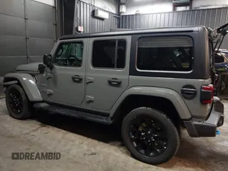 2022 Jeep Wrangler Unlimited Sahara with VIN 1C4JJXP66NW198723, listed as a IAAI auction lot 41368728 with 31,814 mi miles and . Bid and sale history available at DreamBid. Image 3.