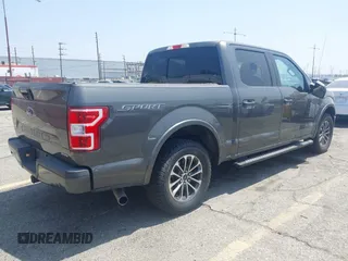 2018 Ford F-150 XL with VIN 1FTEW1CPXJKD56562, listed as a IAAI auction lot 42588371 with 137,496 mi miles and . Bid and sale history available at DreamBid. Image 4.