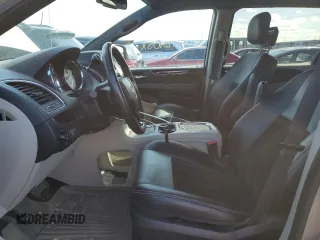 2016 Dodge Grand Caravan SXT with VIN 2C4RDGCG5GR219517, listed as a Copart auction lot 50052405 with 104,552 mi miles and Salvage Title. Bid and sale history available at DreamBid. Image 7.