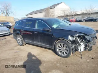 2013 Lincoln MKT EcoBoost with VIN 2LMHJ5AT6DBL55328, listed as a IAAI auction lot 41806881 with 72,740 mi miles. Bid and sale history available at carsss.com. Image 1.
