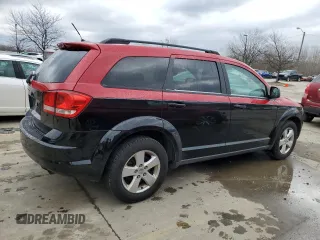 2013 Dodge Journey SE with VIN 3C4PDCAB3DT723547, listed as a Copart auction lot 48140495 with 159,979 mi miles and Salvage title. Bid and sale history available at DreamBid. Image 3.