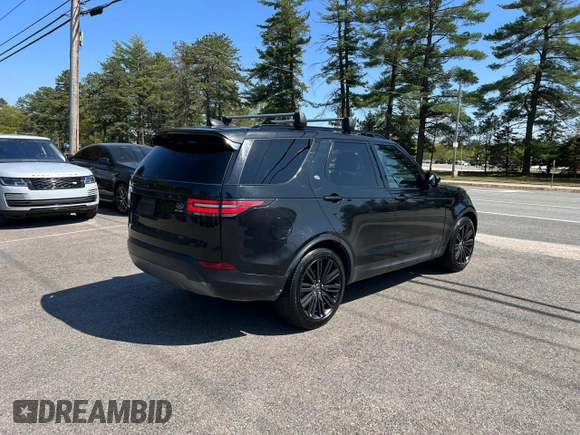 2017 Land Rover Discovery HSE with VIN SALRRBBV7HA045811, listed as a Copart auction lot 56986075 with 142,357 mi miles and Clean Title. Bid and sale history available at DreamBid. Image 4.