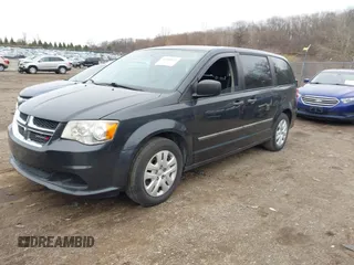 2014 Dodge Grand Caravan American Value with VIN 2C4RDGBG9ER463136, listed as a IAAI auction lot 41968032 with 184,138 mi miles and . Bid and sale history available at DreamBid. Image 2.