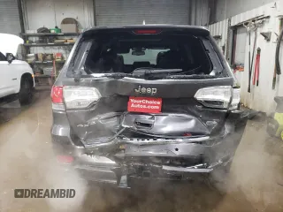 2015 Jeep Grand Cherokee Overland with VIN 1C4RJFCT2FC613502, listed as a Copart auction lot 89207005 with 124,482 mi miles and Salvage Title. Bid and sale history available at carsss.com. Image 6.
