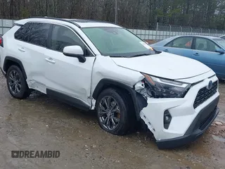 2023 Toyota RAV4 Hybrid XLE Premium with VIN JTMB6RFV4PD114763, listed as a IAAI auction lot 41766812 with 6,768 mi miles. Bid and sale history available at carsss.com. Image 6.