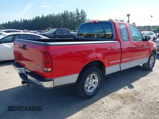 1997 Ford F-150 with VIN 2FTEX17L9VCA27687, listed as a IAAI auction lot 42454035 with 122,179 mi miles and . Bid and sale history available at DreamBid. Image 4.