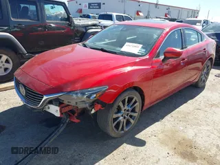 2017 Mazda 6 Grand Touring with VIN JM1GL1W52H1139776, listed as a IAAI auction lot 41671005 with 40,884 mi miles and . Bid and sale history available at DreamBid. Image 2.