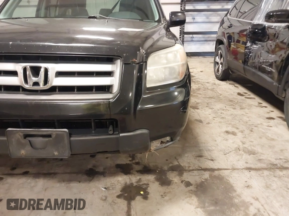 2007 Honda Pilot EX-L with VIN 5FNYF18677B017230, listed as a IAAI auction lot 41727853 with 257,527 mi miles and . Bid and sale history available at DreamBid. Image 6.
