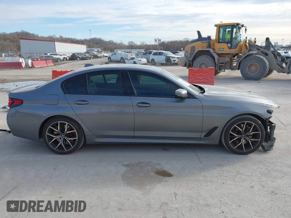 2023 BMW 5 Series 530i xDrive with VIN WBA13BJ04PCL98504, listed as a IAAI auction lot 41702411 with 27,830 mi miles and . Bid and sale history available at DreamBid. Image 14.