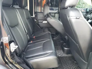 2016 Jeep Wrangler Unlimited Rubicon with VIN 1C4HJWFG9GL220687, listed as a Copart auction lot 60552705 with 49,525 mi miles and Salvage title. Bid and sale history available at DreamBid. Image 11.