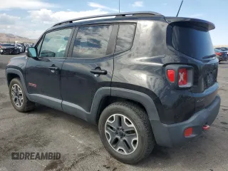 2015 Jeep Renegade Trailhawk z VIN ZACCJBCT1FPC41628, wystawiony jako Copart lot #59054825 z przebiegiem 138 053 mil mil oraz Szkoda całkowita • Salvage title. Historia ofert i sprzedaży dostępna na DreamBid. Obrazek 2.