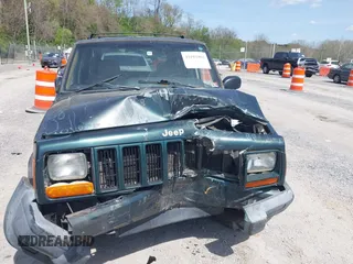 1999 Jeep Cherokee Sport with VIN 1J4FF68S7XL538831, listed as a IAAI auction lot 42101903 with 255,734 mi miles and . Bid and sale history available at DreamBid. Image 12.