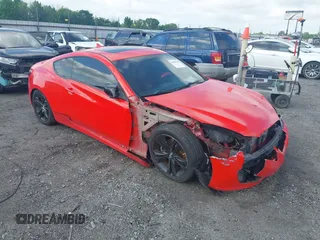 2012 Hyundai Genesis Coupe Grand Touring z VIN KMHHU6KH0CU078557, wystawiony jako IAAI lot #42106396 z przebiegiem 171 913 mil mil oraz . Historia ofert i sprzedaży dostępna na DreamBid. Obrazek 1.
