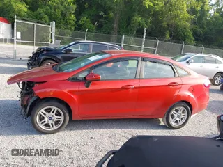 2019 Ford Fiesta SE z VIN 3FADP4BJXKM122235, wystawiony jako IAAI lot #42457164 z przebiegiem 103 265 mil mil oraz . Historia ofert i sprzedaży dostępna na DreamBid. Obrazek 14.