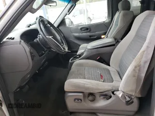 2002 Ford F-150 XL with VIN 1FTRX18L42NB60380, listed as a Copart auction lot 51806955 with 293,591 mi miles and Salvage title. Bid and sale history available at DreamBid. Image 7.