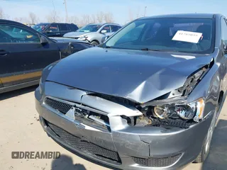 2014 Mitsubishi Lancer ES z VIN JA32U2FU5EU000609, wystawiony jako IAAI lot #41785055 z przebiegiem 140 496 mil mil oraz . Historia ofert i sprzedaży dostępna na DreamBid. Obrazek 6.