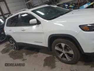 2019 Jeep Cherokee Limited with VIN 1C4PJMDN4KD291672, listed as a IAAI auction lot 41559091 with 47,109 mi miles and . Bid and sale history available at DreamBid. Image 13.