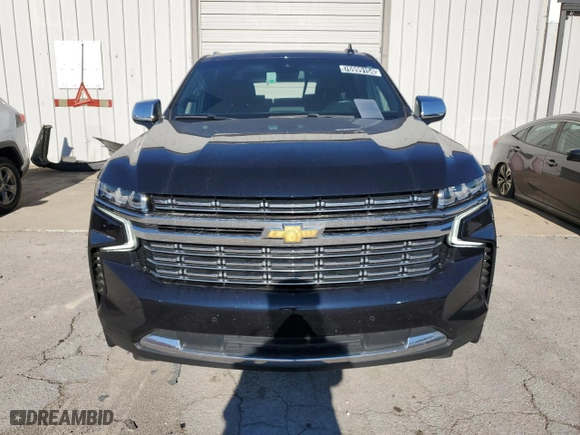 2023 Chevrolet Suburban Premier with VIN 1GNSCFKD3PR299404, listed as a Copart auction lot 76999154 with 34,463 mi miles and Clean Title. Bid and sale history available at carsss.com. Image 5.