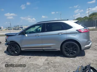 2024 Ford Edge SE with VIN 2FMPK4G91RBA63054, listed as a IAAI auction lot 41973609 with 14,707 mi miles and . Bid and sale history available at DreamBid. Image 14.