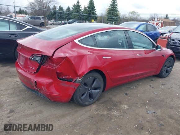 2018 Tesla Model 3 Long Range Battery with VIN 5YJ3E1EB3JF129772, listed as a IAAI auction lot 42017305 with 103,825 mi miles and . Bid and sale history available at DreamBid. Image 4.