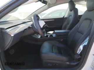 2023 Tesla Model 3 with VIN 5YJ3E1EA6PF423070, listed as a Copart auction lot 52029985 with 19,541 mi miles and Salvage Title. Bid and sale history available at DreamBid. Image 7.