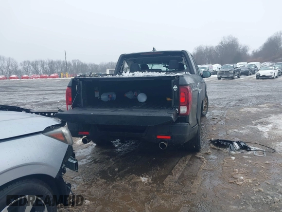 2021 Honda Ridgeline Sport with VIN 5FPYK3F12MB002877, listed as a IAAI auction lot 41576812 with 51,658 mi miles and . Bid and sale history available at DreamBid. Image 17.