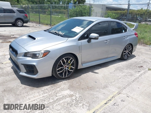 2021 Subaru WRX STI with VIN JF1VA2E66M9822014, listed as a IAAI auction lot 42499316 with 55,625 mi miles and . Bid and sale history available at DreamBid. Image 2.