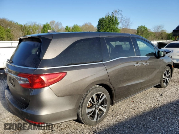 2018 Honda Odyssey Elite with VIN 5FNRL6H98JB087489, listed as a Copart auction lot 51930205 with 149,595 mi miles and Salvage Title. Bid and sale history available at DreamBid. Image 3.