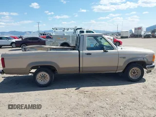 1990 Ford Ranger with VIN 1FTCR10T5LPB09214, listed as a IAAI auction lot 42111036 with 61,289 mi miles and . Bid and sale history available at DreamBid. Image 14.