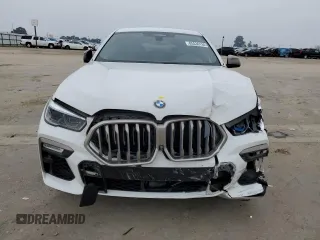 2021 BMW X6 M50i with VIN 5UXCY8C04M9D98395, listed as a Copart auction lot 85536134 with 57,891 mi miles and Salvage Title. Bid and sale history available at carsss.com. Image 5.