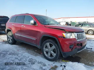 2013 Jeep Grand Cherokee Overland with VIN 1C4RJFCT3DC543862, listed as a IAAI auction lot 41370366 with 65,978 mi miles. Bid and sale history available at carsss.com. Image 1.