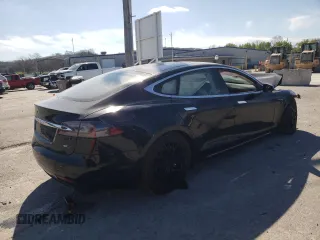 2016 Tesla Model S 90D with VIN 5YJSA1E26GF168260, listed as a Copart auction lot 48703154 with 90,567 mi miles and Salvage Title. Bid and sale history available at DreamBid. Image 3.