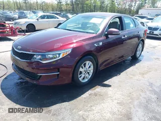 2017 Kia Optima LX with VIN 5XXGT4L32HG150608, listed as a IAAI auction lot 41963406 with 71,521 mi miles. Bid and sale history available at carsss.com. Image 2.