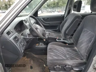 1999 Honda CR-V LX with VIN JHLRD1749XC079612, listed as a Copart auction lot 71930674 with 278,599 mi miles and Salvage Title. Bid and sale history available at carsss.com. Image 7.