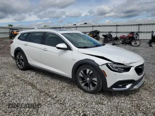2018 Buick Regal Essence with VIN W04GV8SX1J1086174, listed as a Copart auction lot 53816155 with 82,471 mi miles and Salvage title. Bid and sale history available at DreamBid. Image 4.