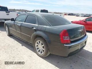2006 Chrysler 300 C with VIN 2C3KA63H56H316500, listed as a IAAI auction lot 41811247 with 135,100 mi miles. Bid and sale history available at carsss.com. Image 3.