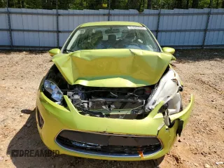 2012 Ford Fiesta SE z VIN 3FADP4BJ7CM164850, wystawiony jako Copart lot #51680925 z przebiegiem 184 884 mil mil oraz Szkoda całkowita • Salvage title. Historia ofert i sprzedaży dostępna na DreamBid. Obrazek 5.