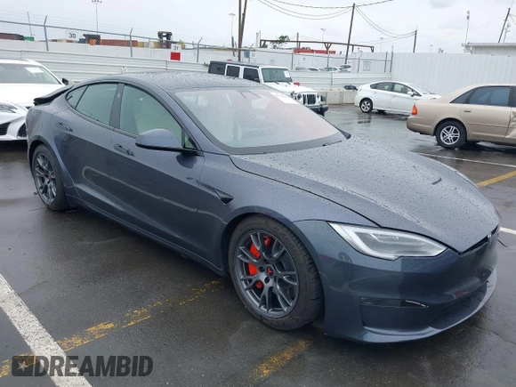 2022 Tesla Model S with VIN 5YJSA1E52NF459460, listed as a IAAI auction lot 41736236 with Not Provided miles and . Bid and sale history available at DreamBid. Image 1.
