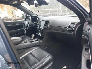 2021 Jeep Grand Cherokee Limited z VIN 1C4RJFBG1MC565928, wystawiony jako IAAI lot #41814256 z przebiegiem 70 324 mil mil oraz . Historia ofert i sprzedaży dostępna na DreamBid. Obrazek 5.