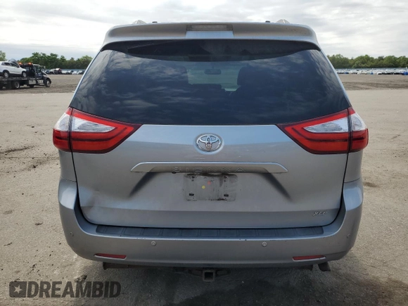 2015 Toyota Sienna XLE with VIN 5TDYK3DC2FS529006, listed as a Copart auction lot 62750995 with 142,990 mi miles and Salvage title. Bid and sale history available at DreamBid. Image 6.