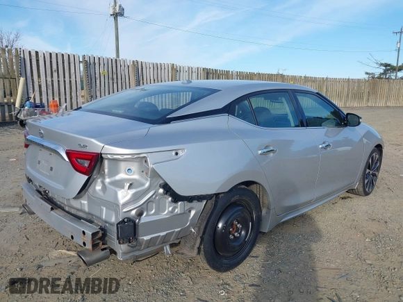 2016 Nissan Maxima SL with VIN 1N4AA6AP8GC414514, listed as a IAAI auction lot 41759903 with 124,116 mi miles and . Bid and sale history available at DreamBid. Image 4.