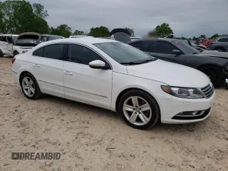 2013 Volkswagen CC R-Line z VIN WVWBN7AN6DE504252, wystawiony jako Copart lot #51750095 z przebiegiem 166 427 mil mil oraz Czysty tytuł • Clean title. Historia ofert i sprzedaży dostępna na DreamBid. Obrazek 4.
