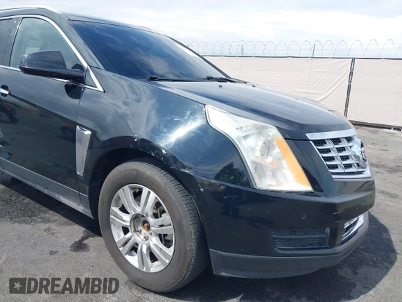 2014 Cadillac SRX Luxury Collection z VIN 3GYFNEE30ES650372, wystawiony jako IAAI lot #42195783 z przebiegiem 169 113 mil mil oraz . Historia ofert i sprzedaży dostępna na DreamBid. Obrazek 6.