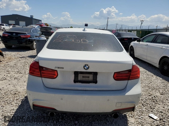 2013 BMW 3 Series 335i xDrive with VIN WBA3B9C59DF587947, listed as a Copart auction lot 58268305 with Not provided miles and Salvage title. Bid and sale history available at DreamBid. Image 6.